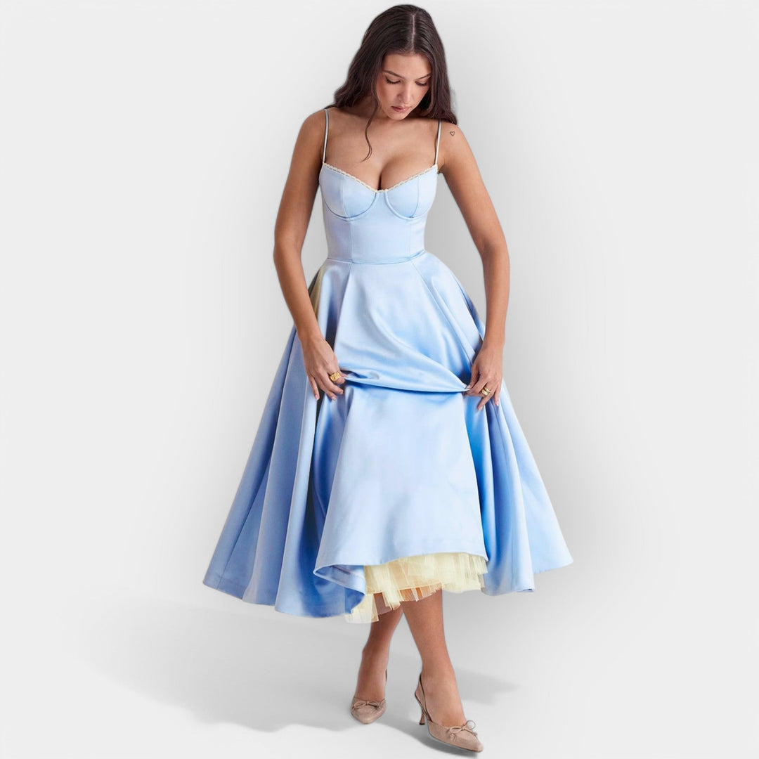 Elegantna Midi Haljina sa Stilskom Linijom