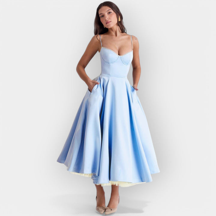 Elegantna Midi Haljina sa Stilskom Linijom