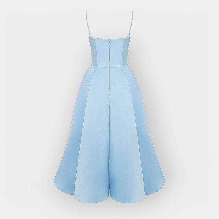 Elegantna Midi Haljina sa Stilskom Linijom